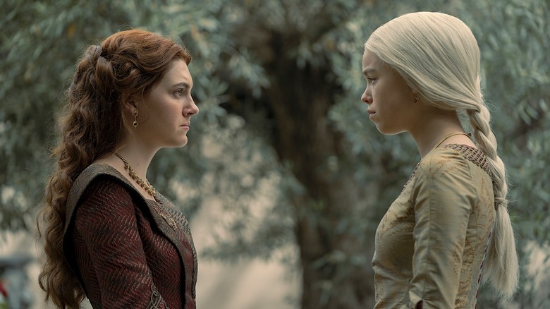 Young Alicent and young Rhaenyra facing each other in House of the Dragon