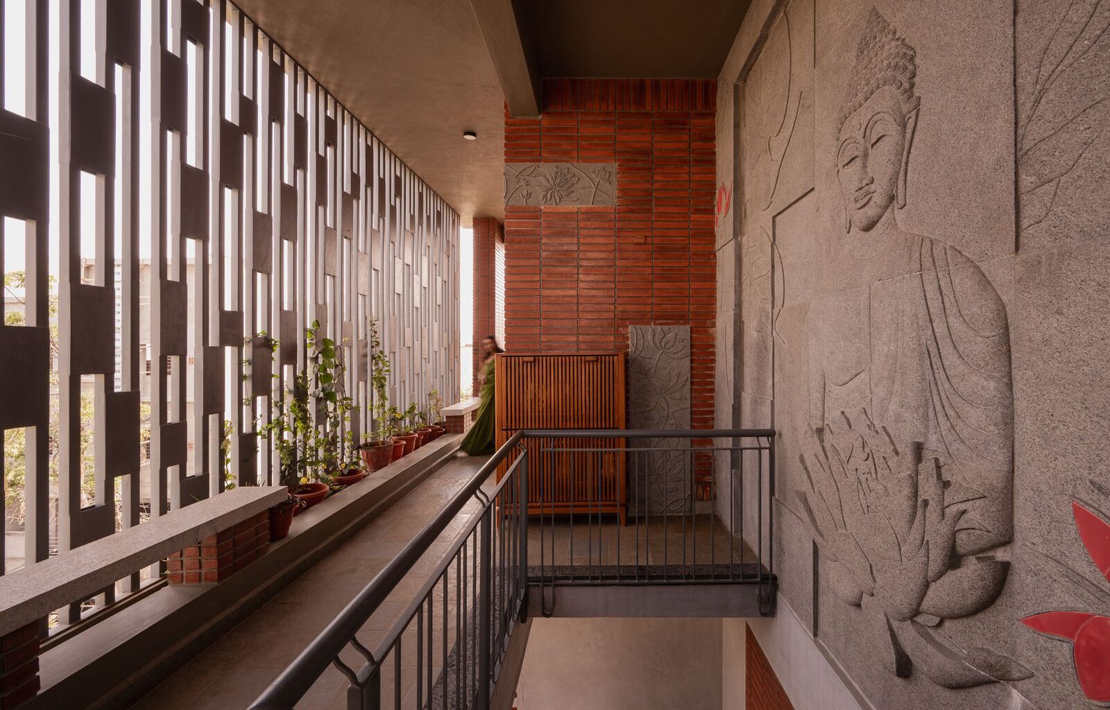 This Family’s “Minimalist” Home Includes a Curlicue Window Seat and a Half-Ton Buddha