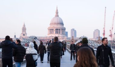 About 90,000 people crossed London's new Millennium Bridge on the day it opened in June 2000, with as many as 2,000 on the deck at once, and it swayed so badly it closed days later; subsequent work found that as few as 160 pedestrians could trigger the instability, and the fix was a system of dampers installed on the bridge.