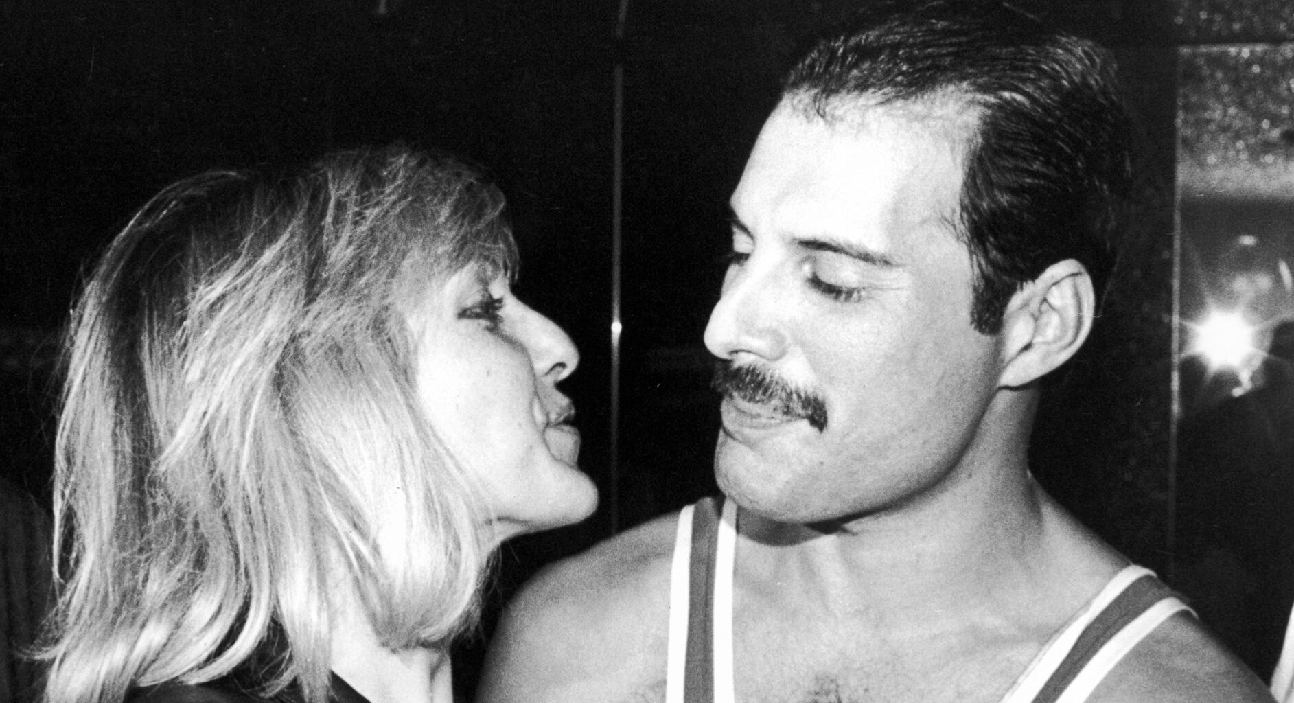 British singer, songwriter and record producer Freddie Mercury (1946 - 1991) of British rock band Queen with his friend Mary Austin