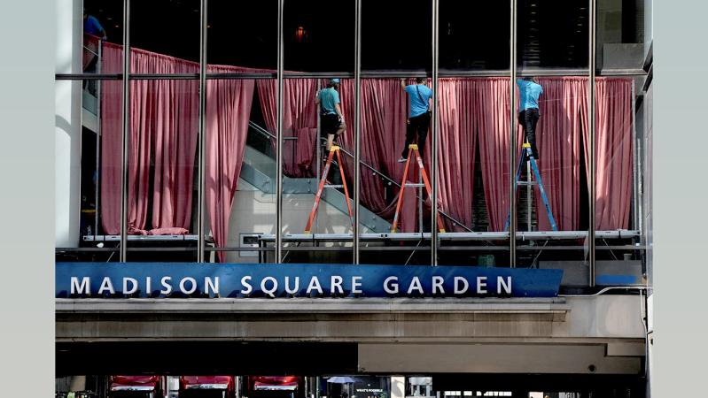 IMAGE: Workers at Madison Square Garden, ahead of Taylor Swift and Travis Kelce's wedding. Photograph: Christian Monterrosa/Reuters/ Rediff Archives