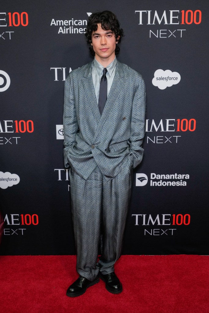 Conan Gray attends the Time100 Next event in a gray patterned suit.