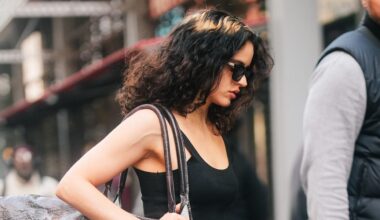 Rosalía Wears a Massive Printed-Leather Duffel Bag With Sky-High Ballerina Heels