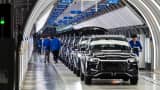 Electric vehicles on the assembly line at the BYD Co. factory in Zhengzhou, Henan province, China, on Wednesday, Nov. 5, 2025.