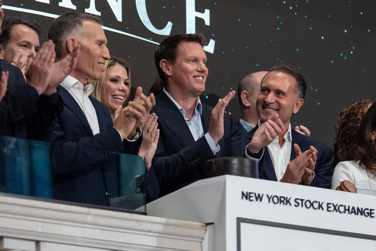 Skydance's CEO David Ellison and others on the floor of the New York Stock Exchange
