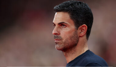 Side-on image of Arsenal manager Mikel Arteta looking onwards.