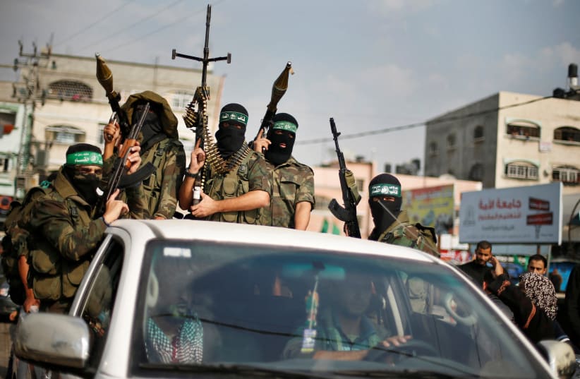 Hamas terrorists celebrating during a rally in the northern Gaza Strip.