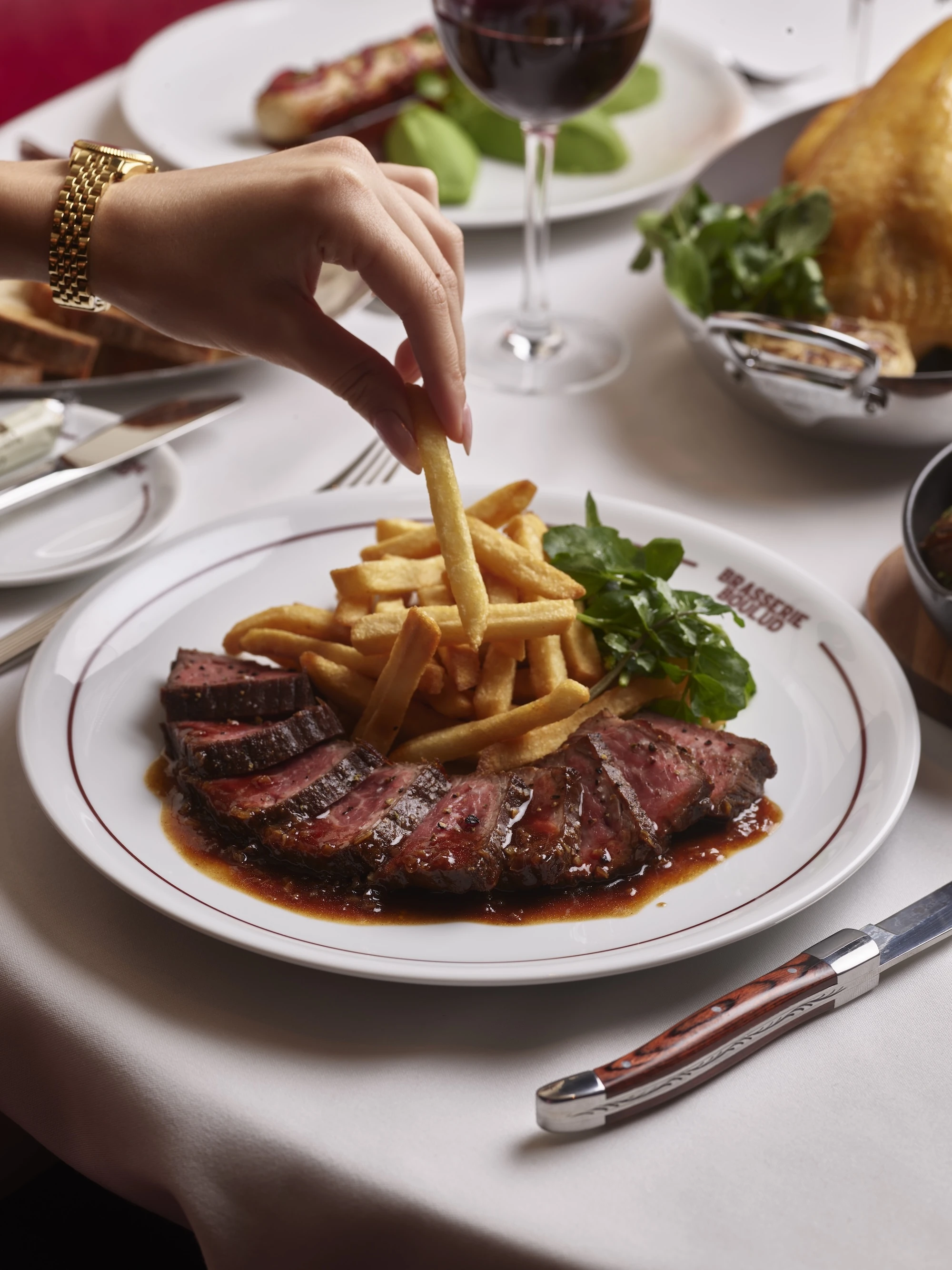 Steak frites at Brasserie Boulud