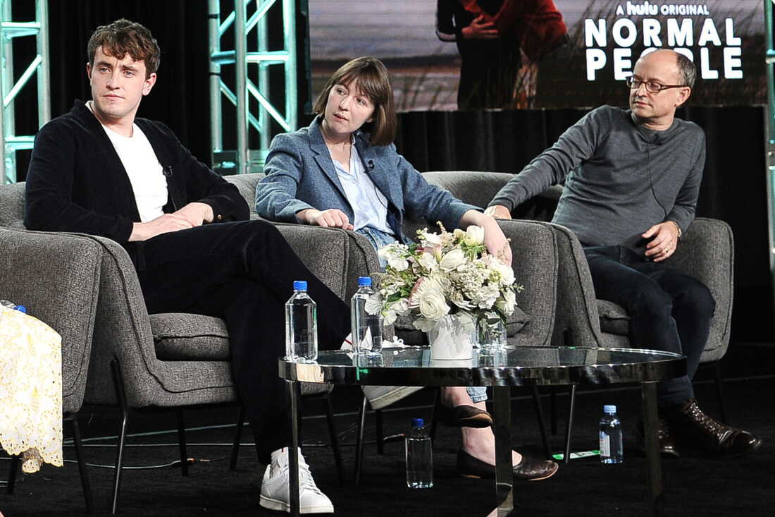 FILE - From left, Paul Mescal, Sally Rooney and Ed Guiney participate in Hulu's "Normal People" panel during the Winter 2020 Television Critics Association Press Tour on Jan. 17, 2020, in Pasadena, Calif.