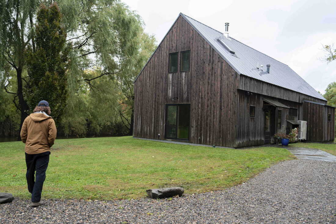 Dessner overlooks the long pond behind his home in upstate New York, which he named his studio after.