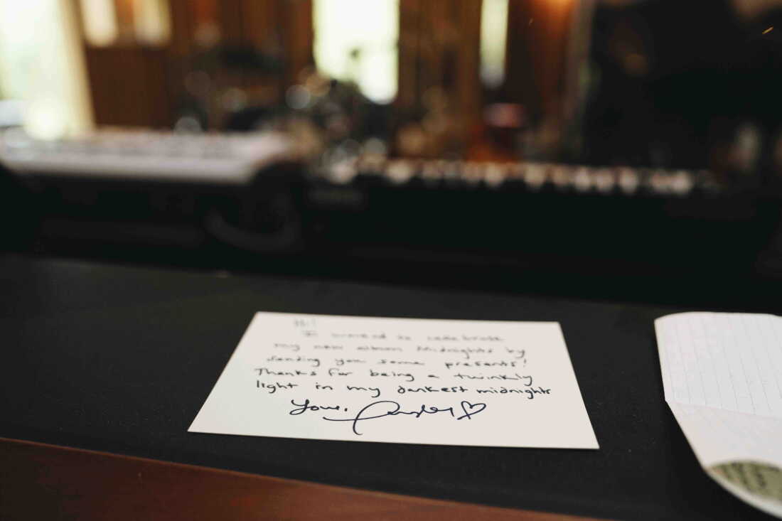 A note from Taylor Swift is left on Dessner's audio console at his at-home studio.