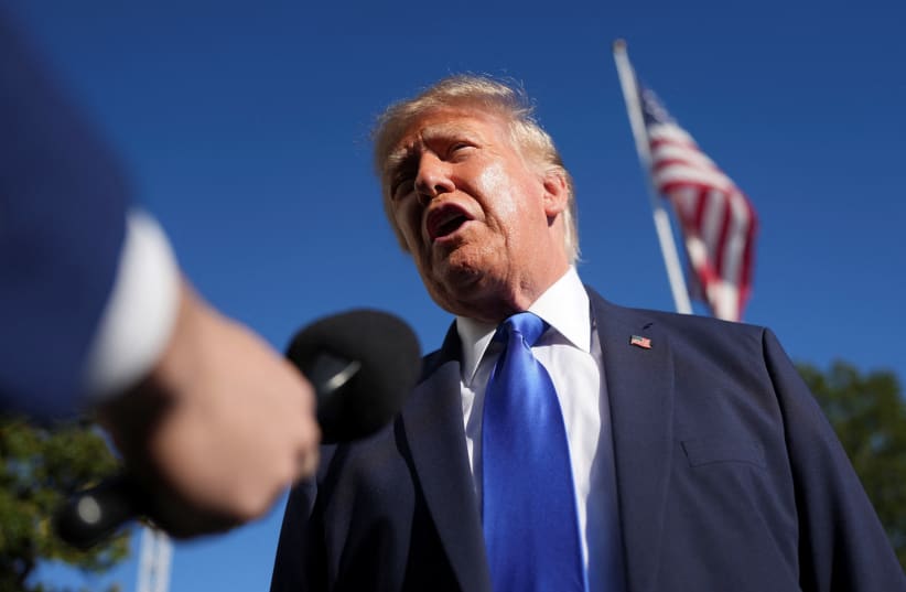 US President Donald Trump speaks to members of the media as he departs the White House en route to Iowa, in Washington, DC, US, October 22, 2026.
