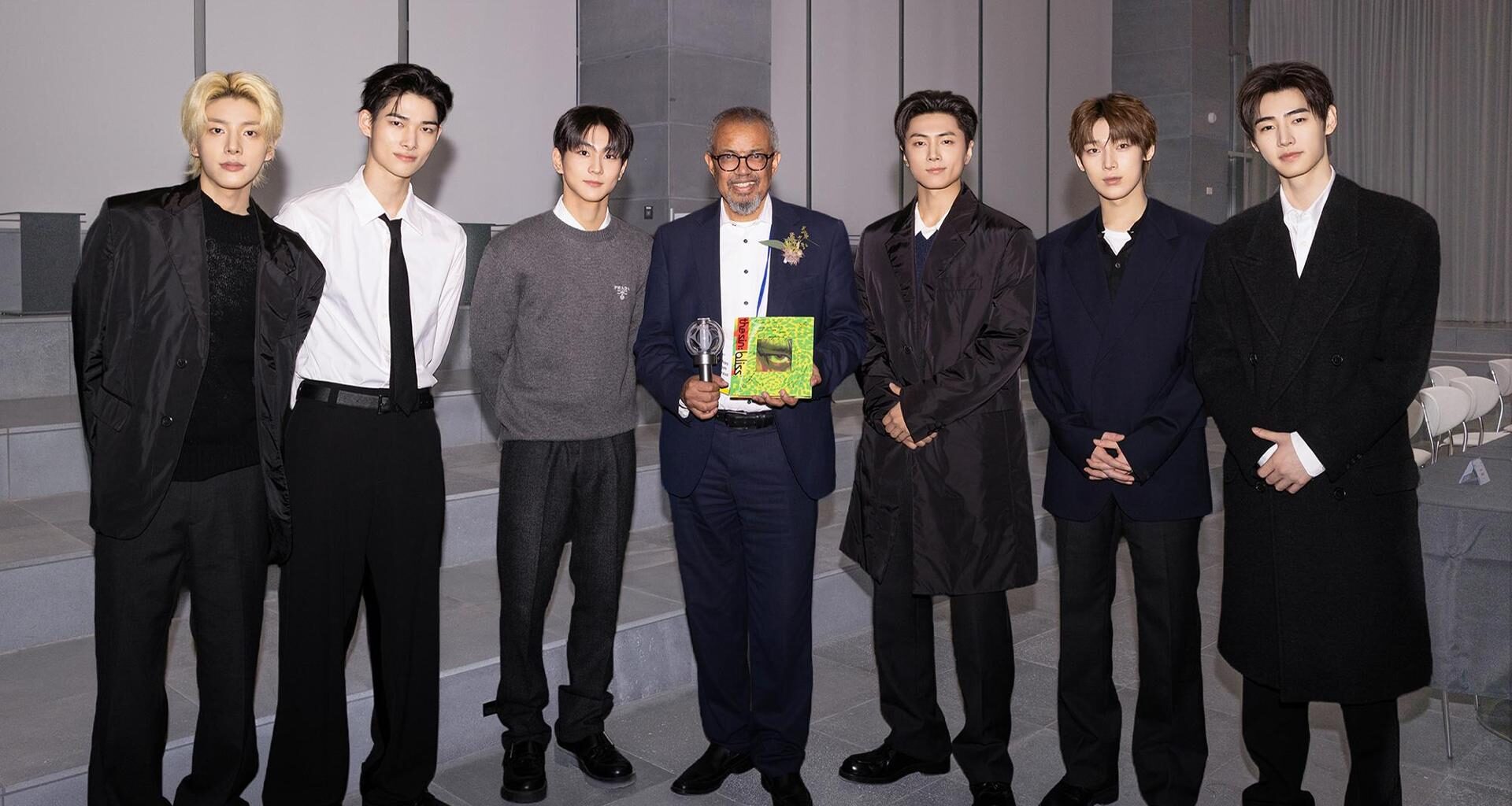 Boy band ENHYPEN poses with World Health Organization Director-General Tedros Adhanom Ghebreyesus, center, at HYBE’s headquarters in Yongsan District, Seoul, Thursday. Courtesy of HYBE