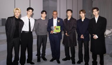 Boy band ENHYPEN poses with World Health Organization Director-General Tedros Adhanom Ghebreyesus, center, at HYBE’s headquarters in Yongsan District, Seoul, Thursday. Courtesy of HYBE