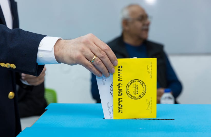 (Illustrative) A man casts his ballot at a voting station on the morning of the municipal elections, in Ashdod, February 27, 2024