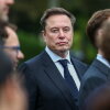 Tesla, SpaceX and X CEO Elon Musk attends a press briefing held by President Trump with AI executives following a meeting on artificial intelligence, outside the West Wing of the White House on Sept. 29