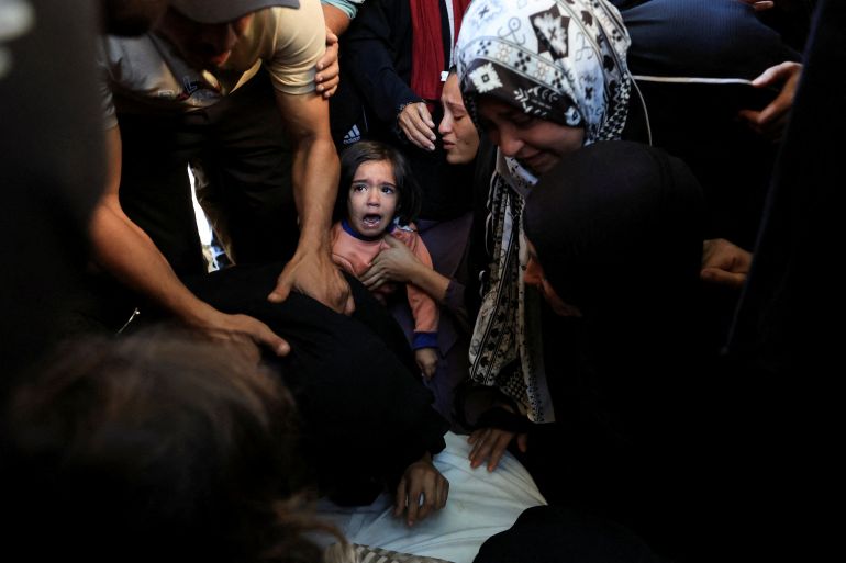 Mourners react during the funeral of Palestinian Tamer al-Sabagh, who was killed in an Israeli strike on Monday, in Gaza City, October 20, 2026 [Dawoud Abu Alkas/Reuters]