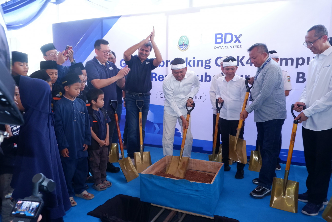 West Java Governor Dedi Mulyadi (center), BDx Indonesia chief executive officer Agus Hartono Wijaya and BDx Data Centers CEO Mayank Srivastava attend the groundbreaking ceremony on July 28, 2026, for the CGK4 campus in Jatiluhur, Purwakarta, West Java, alongside local leaders and community representatives.
