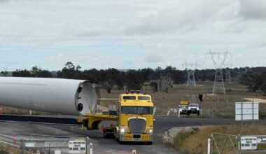 A 213-foot wind turbine blade weighing 22 tons can’t make the right turn at the roundabout outside a McDonald’s in a small Australian town, so the company trucking 141 of them 400 miles inland plans to lay 1,673 feet of new road through the back of town to skip the turn