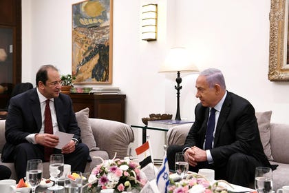 Abbas Kamel and Benjamin Netanyahu meet in Jerusalem, Sunday.