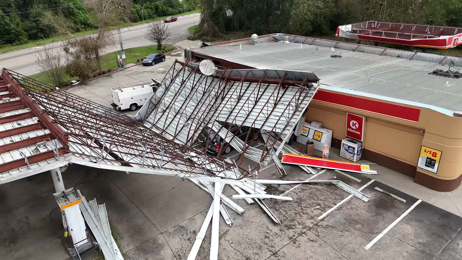 Collapsed roof of gas station due to hurricane damage