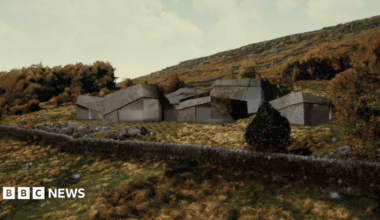 A drawing of a proposed house on moorland which is designed to look like large rocks.