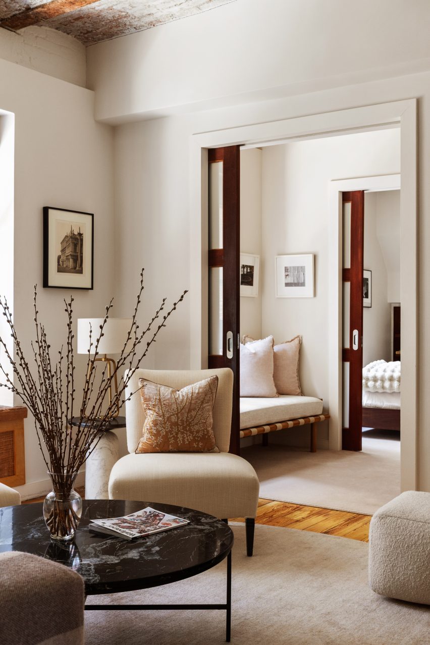 Upstairs bedrooms divided by mahogany sliding doors