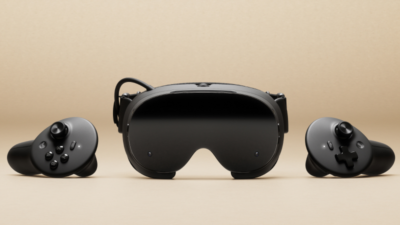 Steam Frame headset flanked by its two controllers on a beige background