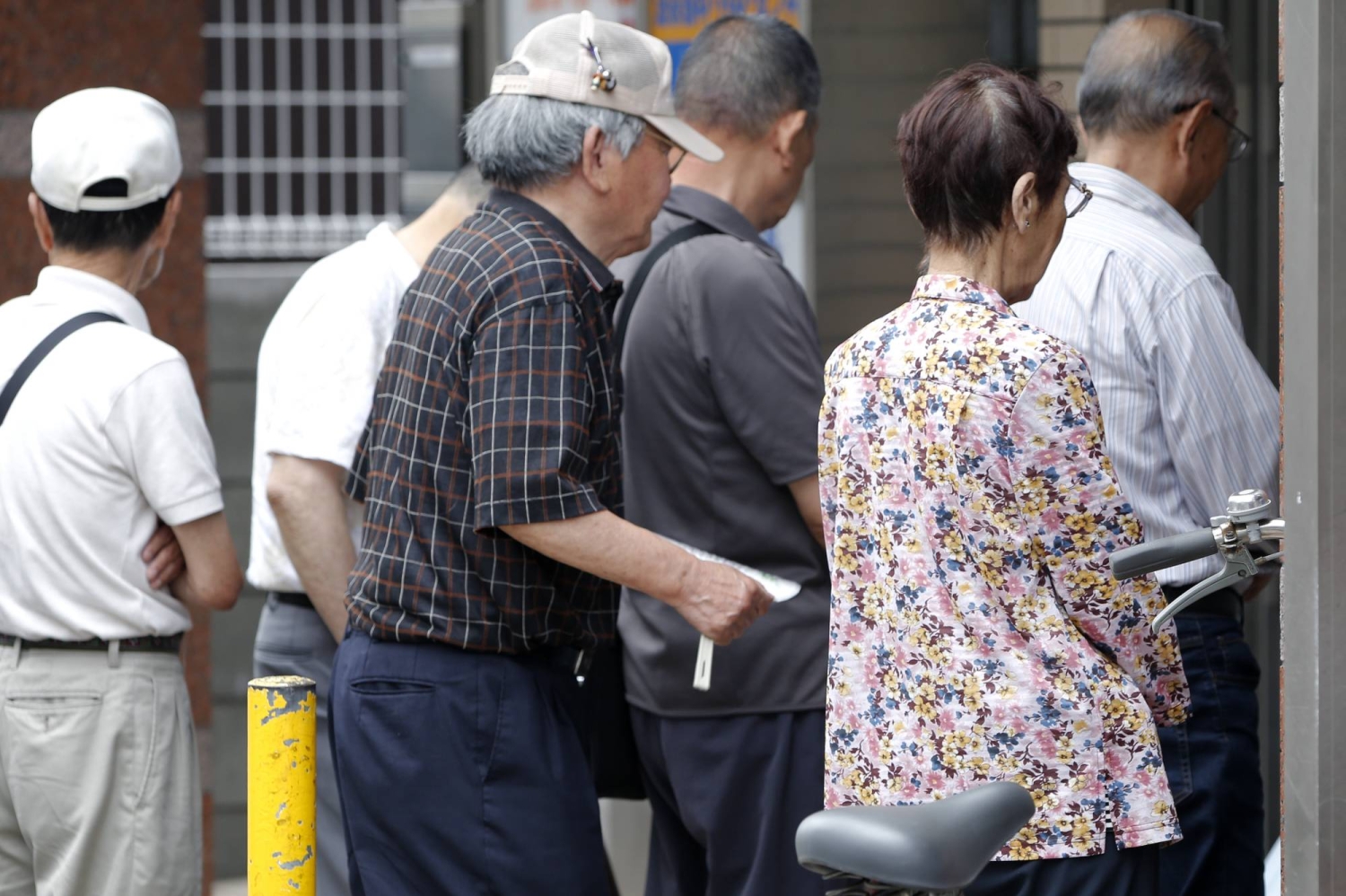 Japan’s health cost caps rise, widening gaps between insurers