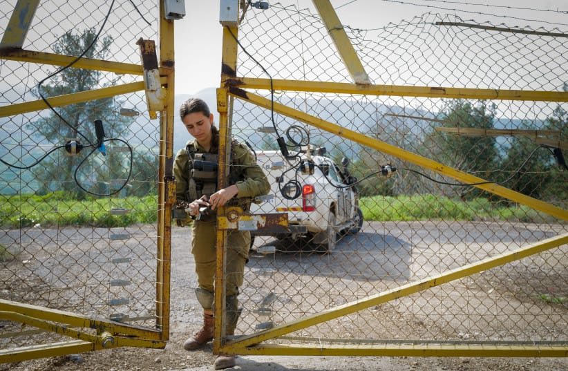 Israeli soldiers near the border fence at the tripoint border between Israel, Syria, and Jordan, February 15, 2024