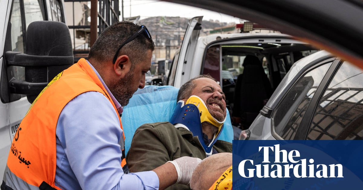 Israeli settlers beat press photographer as soldiers watch in West Bank | West Bank