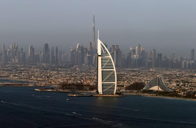 A view of the Burj Al Arab hotel and Burj Khalifa in Dubai, United Arab Emirates, June 9, 2021.