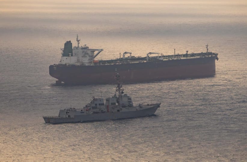 Guided-missile destroyer USS Rafael Peralta (DDG 115) enforces the US blockade on Iranian ports against an Iranian-flagged ship attempting to sail to a port in Iran, April 24, 2026.
