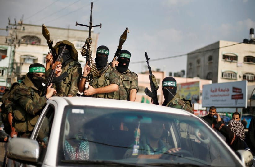 Hamas terrorists celebrating during a rally in the northern Gaza Strip.