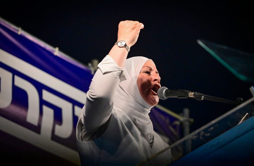 Party member Somaya Bashir speaks during a Democrats party conference at Rabin Square in Tel Aviv, July 25, 2026.