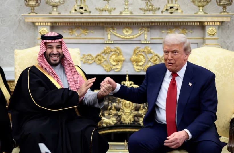 US President Donald Trump and Saudi Crown Prince and Prime Minister Mohammed bin Salman hold hands during a meeting in the Oval Office at the White House in Washington, DC, US, November 18, 2025.