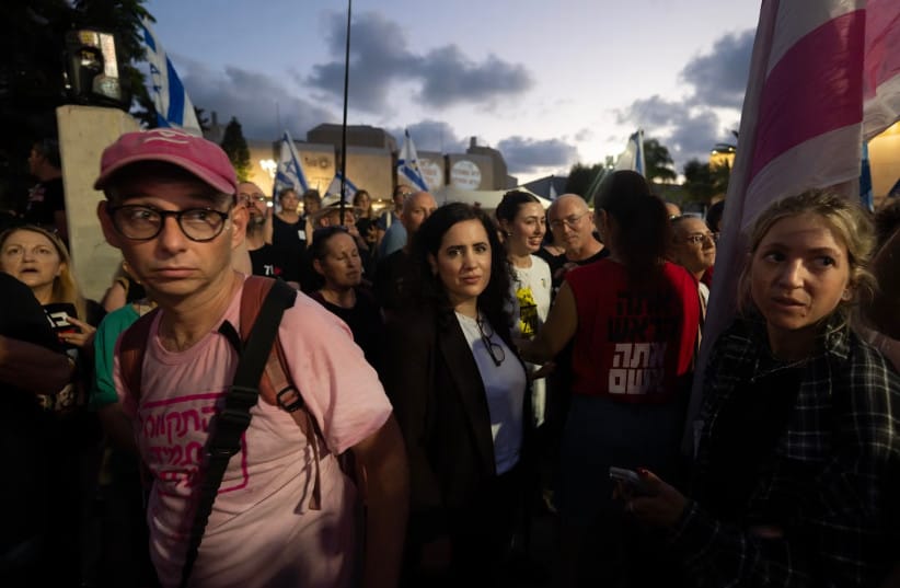 Knesset member Naama Lazimi of the Democratic Party, a leading figure in the opposition to the Israeli government, takes part in an anti-government rally.