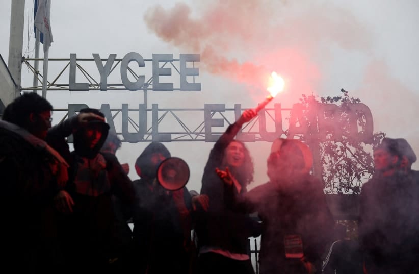 FILE PHOTO: French high school students block the access to the Lycee Paul Eluard high school as they protest to demand the hiring of substitute teachers, increased resources and better learning conditions, in Saint-Denis, near Paris, France, September 30, 2026. 