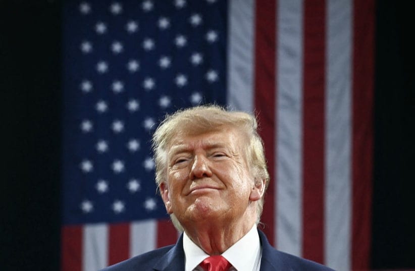 US President Donald Trump arrives to speak during a campaign rally at the Alico Arena, Florida Gulf Coast University in Fort Myers, Florida on October 23, 2026.