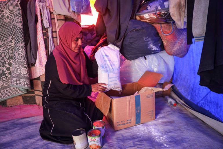 Manal Abu Rabie, a displaced mother of six from northern Gaza, fears worsening hunger as the World Food Programme cuts food assistance