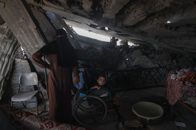Asma Ali says the advancing Yellow Line has left her family uncertain where they can find safety. [Abdelhakim Abu Riash/Al Jazeera]