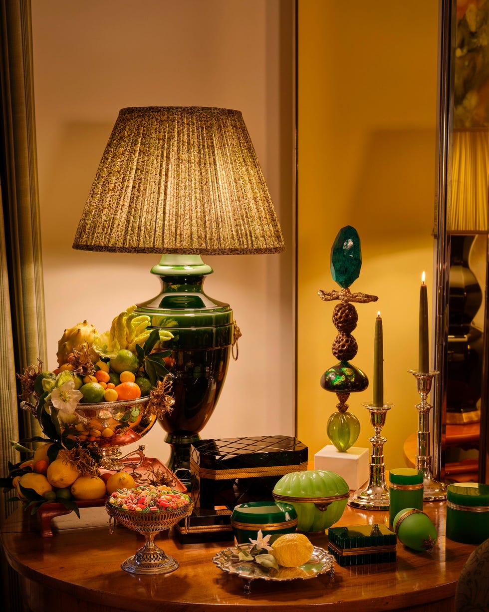 living room table with lamp and other decorative items on top living room table with lamp and other decorative items on top