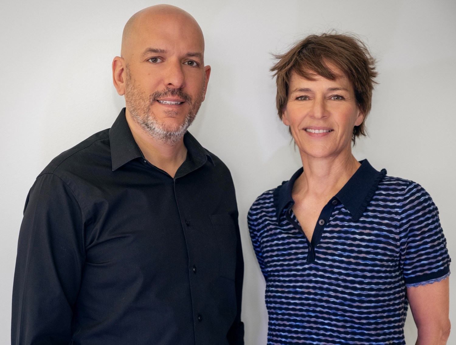 Damien de Froberville, Kristine Belson