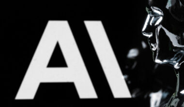 This photograph shows a figurine in front of the logo of the US artificial intelligence safety and research company Anthropic during a photo session in Paris on February 13, 2026. (Joel Saget / AFP via Getty Images)
