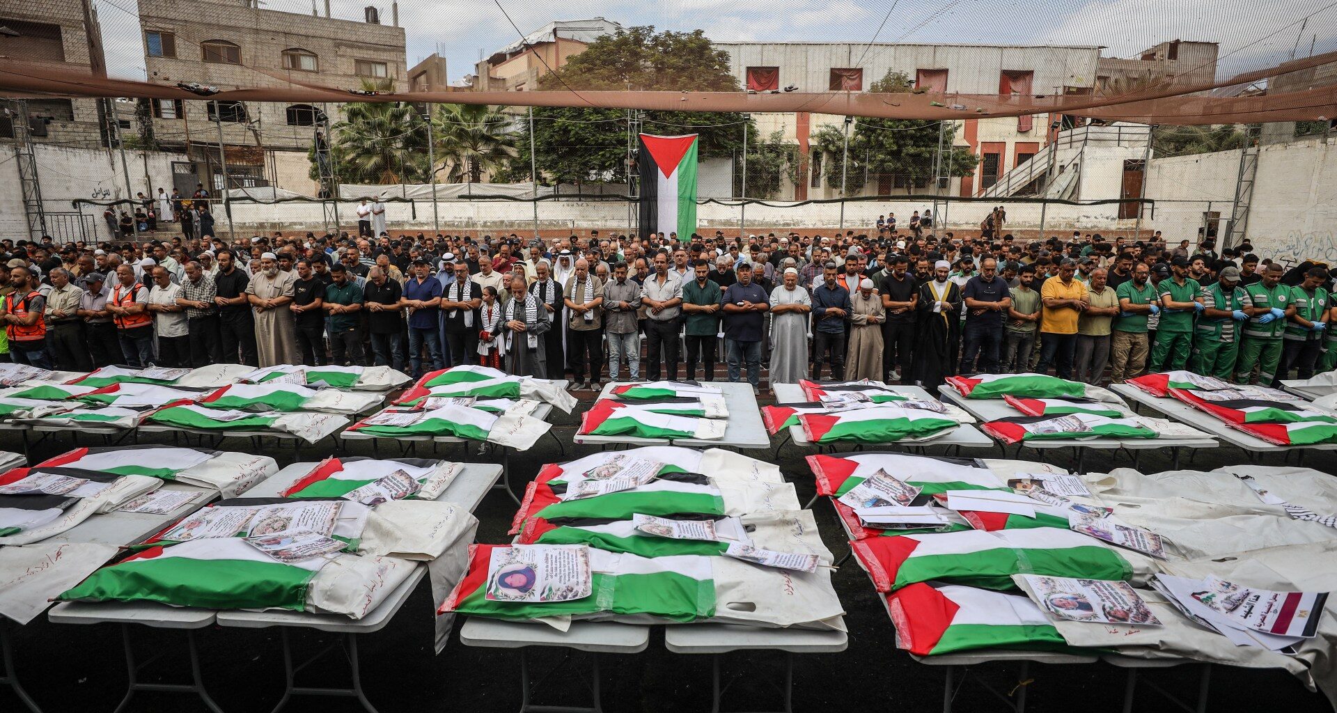 Funeral held for 75 Palestinians after remains recovered from Gaza ruins | Israel-Palestine conflict News