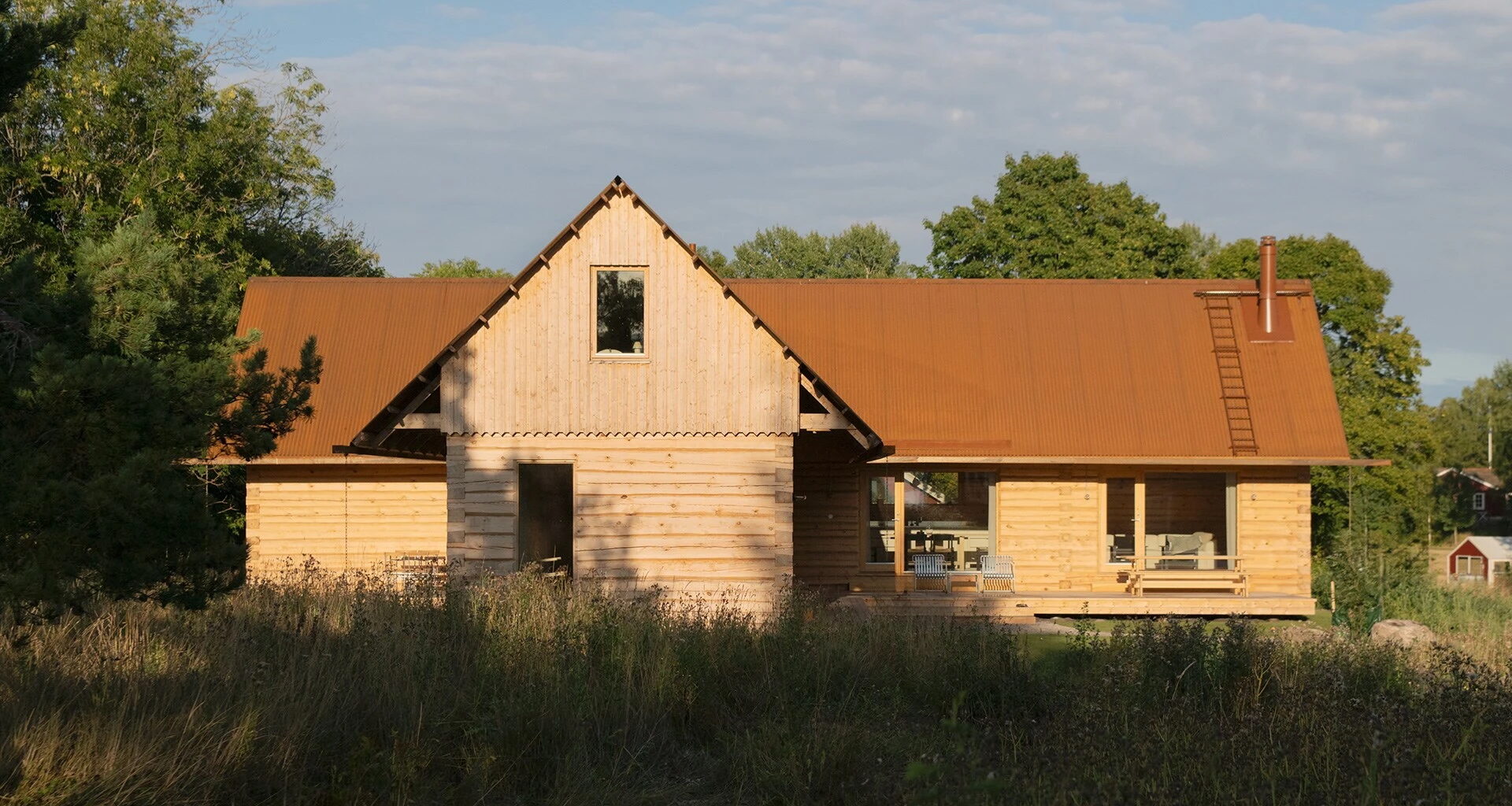Peek inside these two Swedish timber farmsteads, built to sell