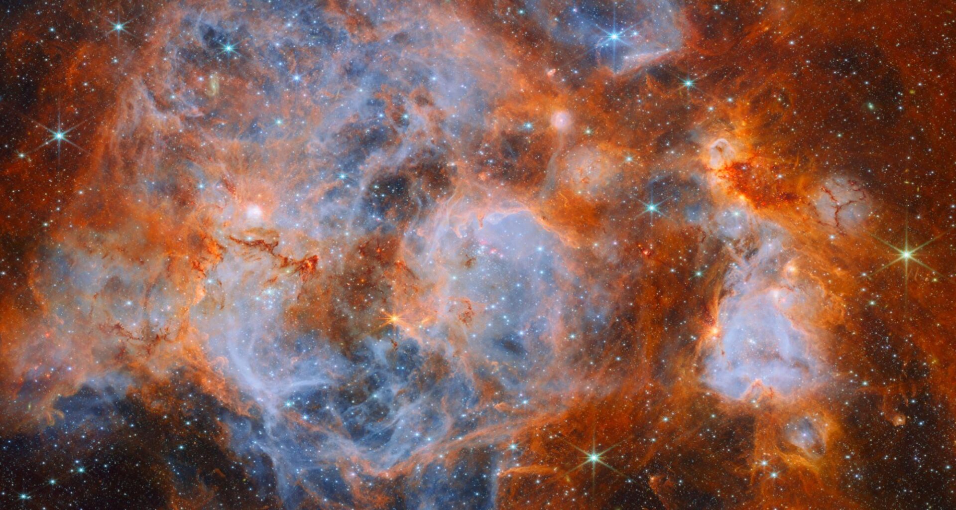 Glowing 'cauldron' of new stars photo of the day for Oct. 26, 2026