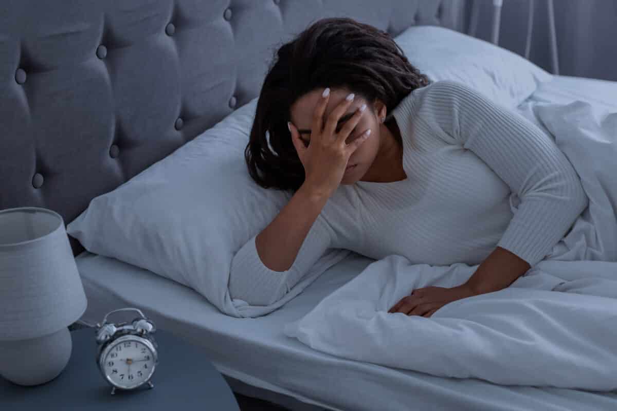 Woman struggling to sleep
