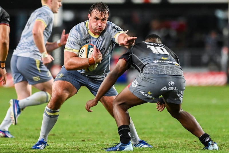 Leinster's Ronan Kelleher comes against of Vusi Moyo of Sharks. Photograph: Darren Stewart/SteveHaagSports/Inpho