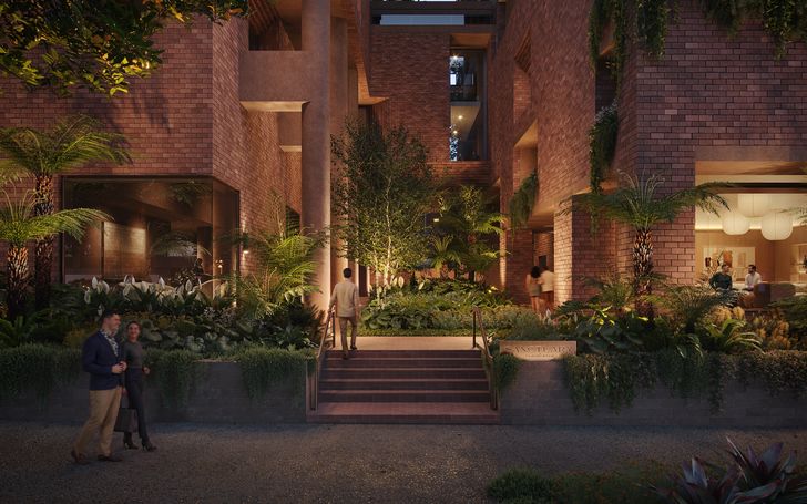 The proposed streetscape combines red brick and concrete architecture with dense greenery with the aim of creating an immersive, nature-focused living environment.